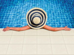 Paving The Way: The Expert's Guide To Maintaining Your Pavers 2 Promenade Woman Hat Pool LR